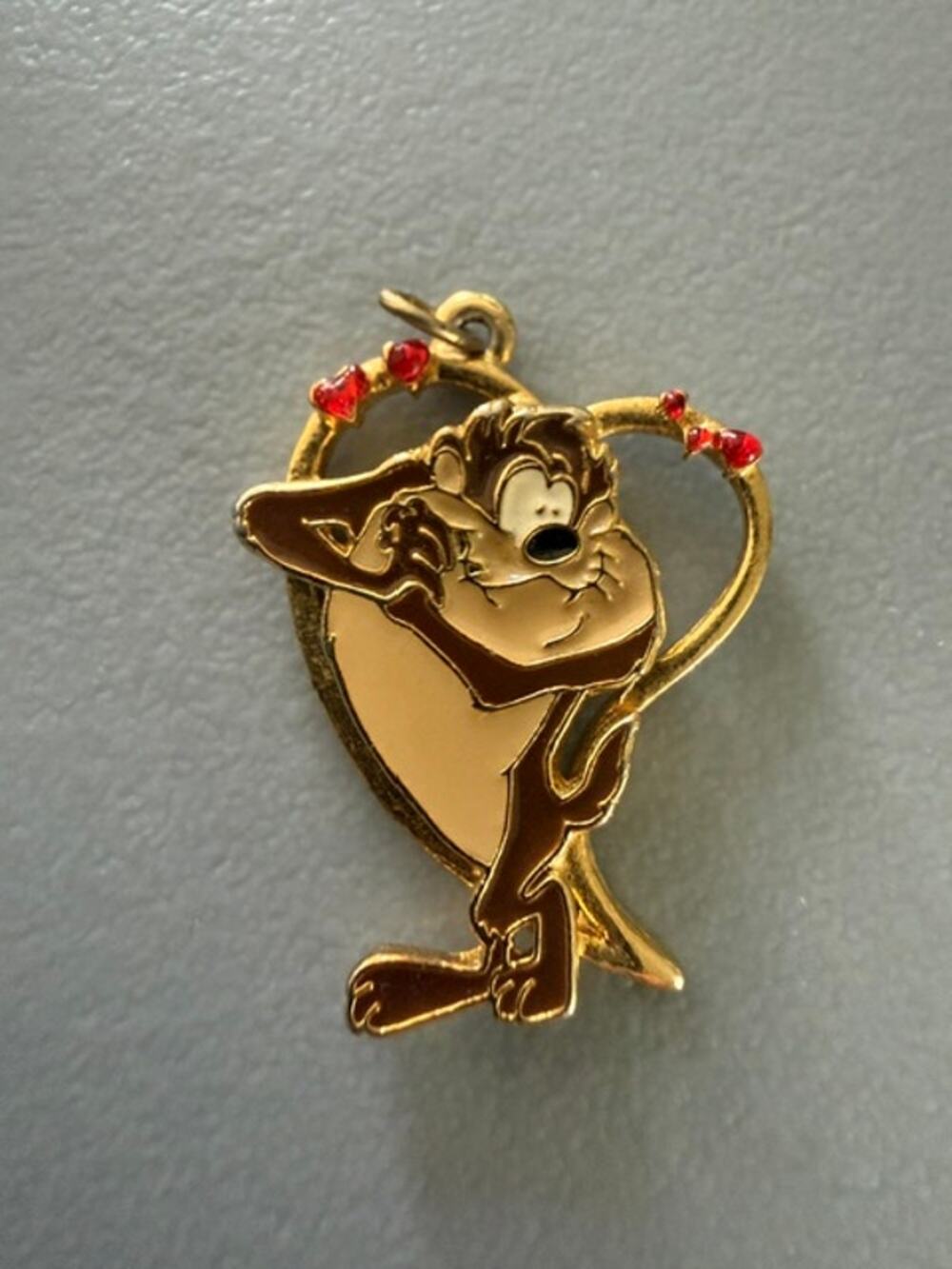 VINTAGE 1993 WARNER BROS. TAZ IN LOVE PENDANT WITH NO CHAIN.